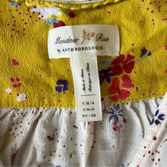 White and yellow floral print wrap top with short sleeves and tie waist #floral - Picture 5 of 6